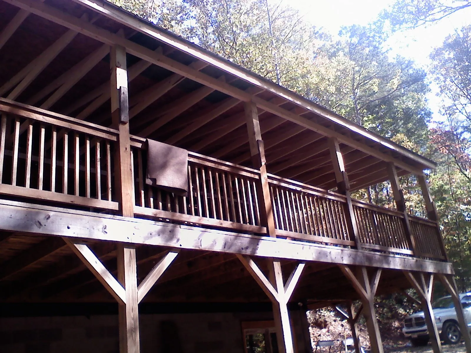 Timber framing under a new elevated porch and deck — Roof Leak Repair in Grimsley by Roofing Brothers